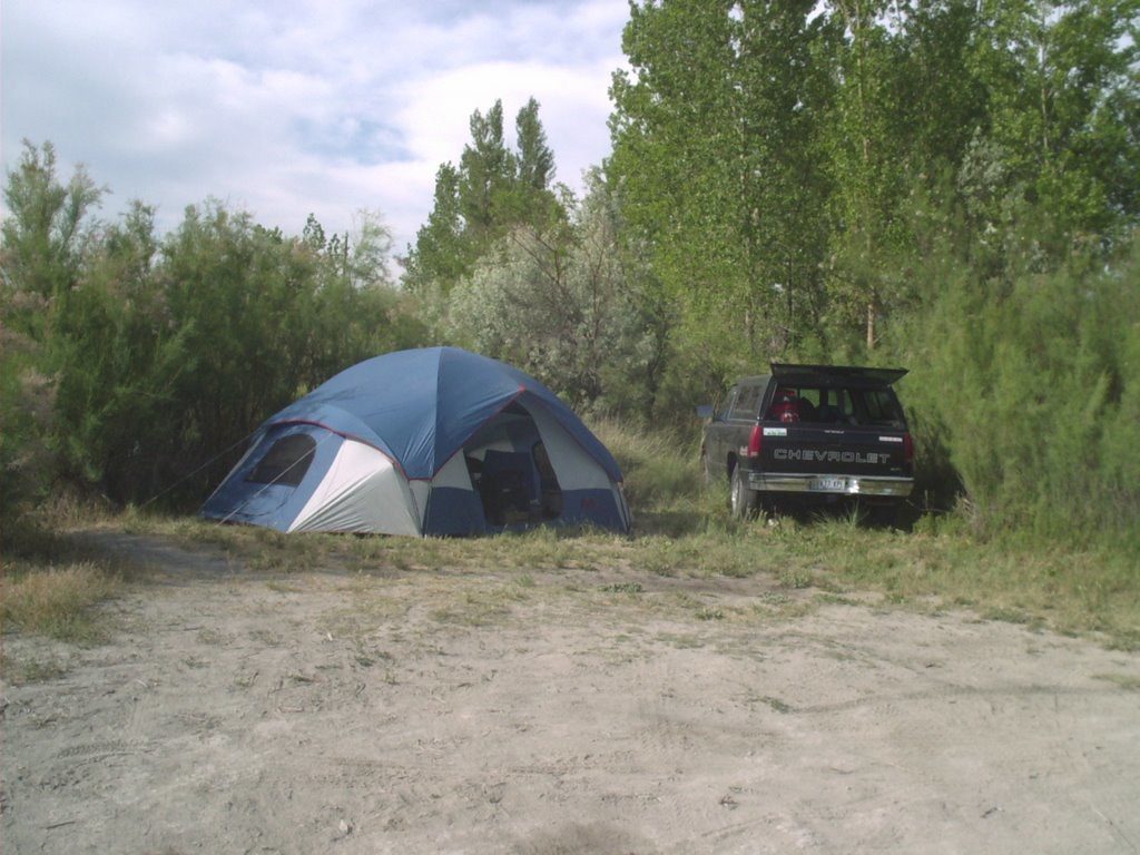 Home Camping tent and vehicle on a pitch — gear hired by the period, not bought