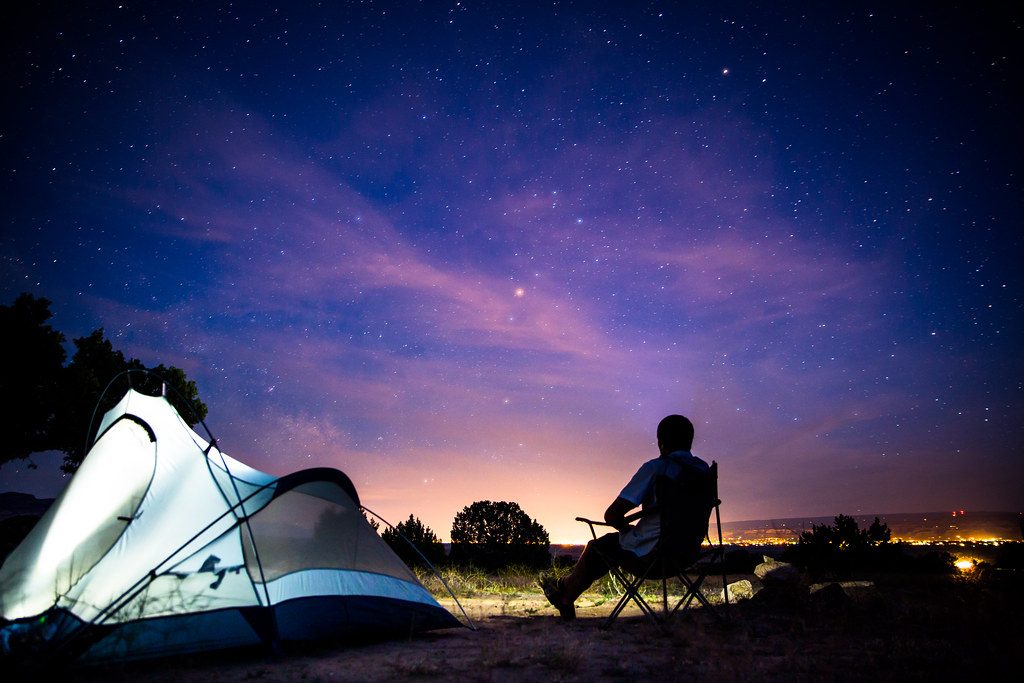 Home Two-person camping tent pitched under a clear evening sky